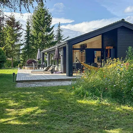 Cozy Home In Dronningmolle With Sauna Сasa de vacaciones Dronningmølle